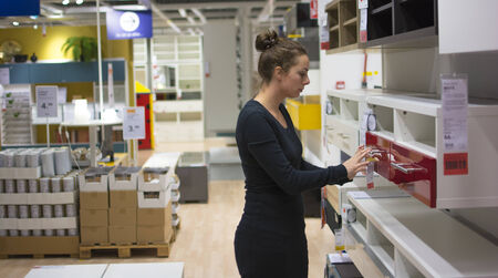 Woman shopping for indoor furnitureのeditorial素材