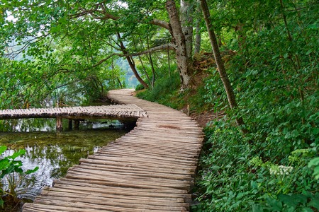 Wooden Road Trail in Plitvice National Park Croatia with Water Streamの写真素材