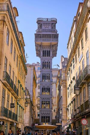 LISBON, PORTUGAL - February 18: The Santa Justa Elevator and People walking on the Streets.のeditorial素材