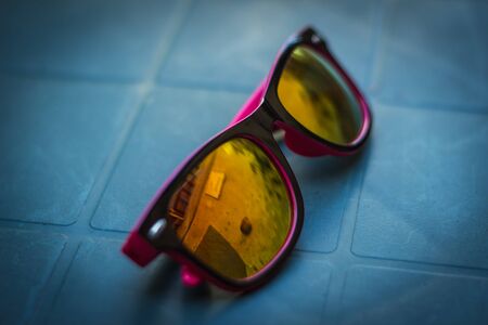 fashion sunglasses on the tableの写真素材