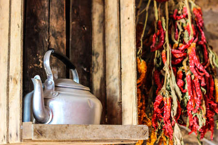 Pressure Cooker with red pepper backgroundの写真素材