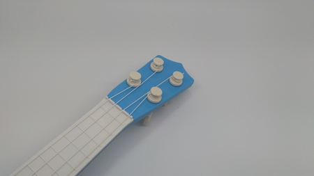 blue toy guitar neckの写真素材