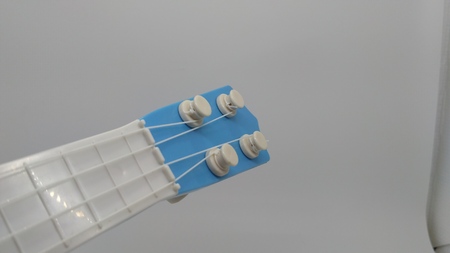 blue toy guitar neckの写真素材