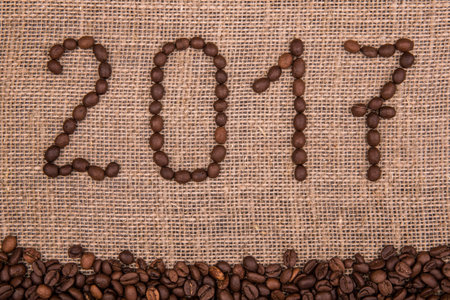 New year 2017 from coffee grains on a sacking