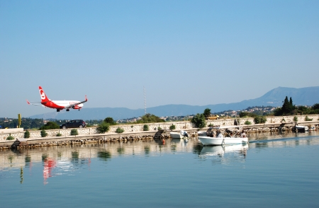 Plane arrives at the airport in Kerkyra, Corfu Island, Greece のeditorial素材