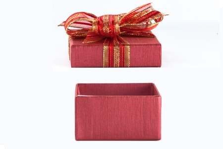 Red festive gift box being openedの写真素材