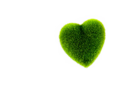 Green grass in heart shape - selective focus in white isolated background - can be used in ecology conceptの写真素材