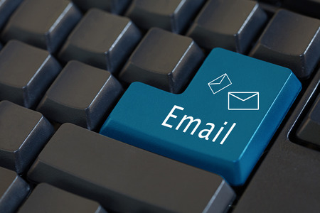 Word 'Email' and its icon on enter keyboardの写真素材