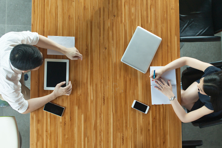Top View of Business or Creative People Discussing Behind the deskの写真素材