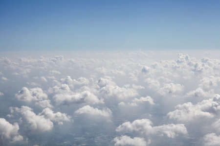 Skyline View above the Clouds from Airplane