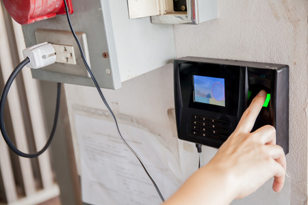 Human performing finger scan to access inside.の写真素材