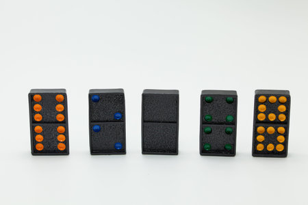 Stack of dominoes isolated on a white background