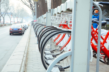 BEIJING,CHINA 6 JANUARY 2017: Public Bike Rental Station in Beijing, China with Bicycles arranging in row ready for public rentalのeditorial素材