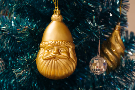 Beautiful decorated Christmas tree background with santa claus ornamentの写真素材