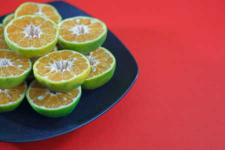 Orange on background colorful. Copyspaceの写真素材
