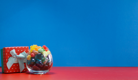 Colorful candy and jelly on background with copy space.の写真素材