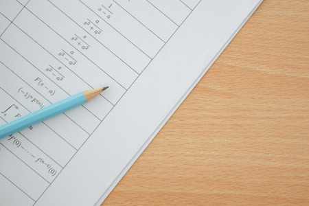 pencil and sheet of paper with maths-formulasの写真素材
