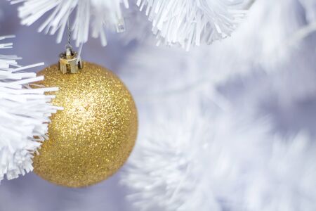 Beautiful decorated snowy fir christmas trees with colorful balls.の写真素材