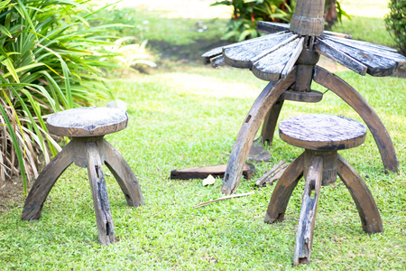 Set of wood garden furniture in the garden.の写真素材