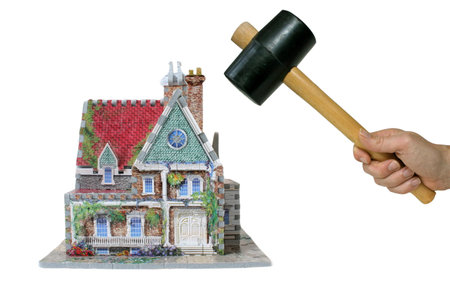 house with hammer isolatedの写真素材