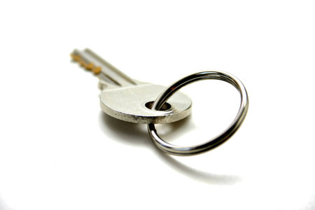 key with key-ring isolated on white background