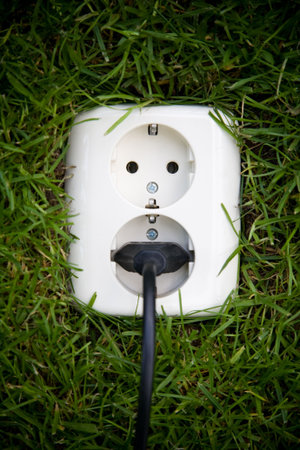 energy concept outllet in grassの写真素材