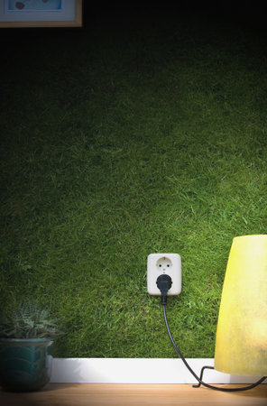 energy concept outllet in grassの写真素材