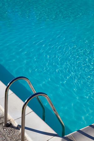 empty swimming-pool in early morningsunの写真素材