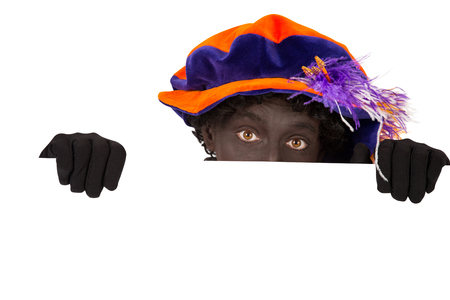 zwarte piet ( black pete)  typical Dutch character part of a traditional event celebrating the birthday of Sinterklaas in decemberの写真素材