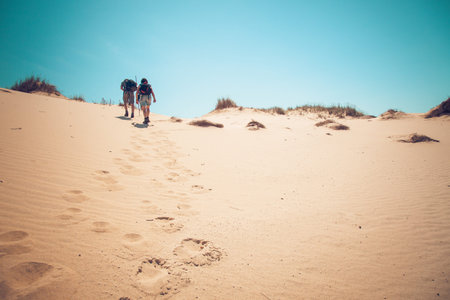 Senior couple walking up a hill.personal edittingの写真素材