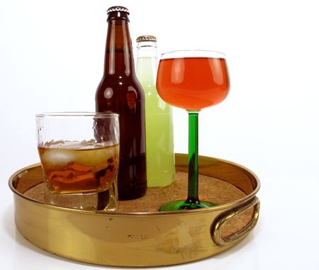 Brass serving tray with assorted adult beverages                               の写真素材