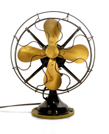 Beautiful black antique brass fan on a white background                               の写真素材