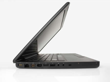 Black Laptop Computer, partlyopen on white                               の写真素材