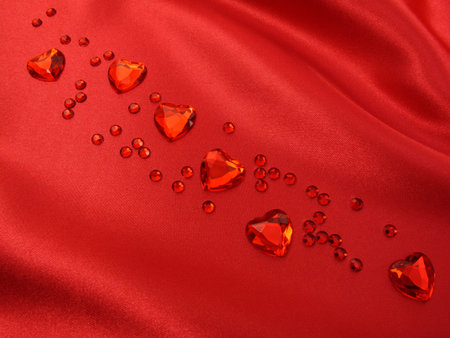 Stunning red crystal hearts on Red Satin...look for more great valentine ideas in my portfolio!                               の写真素材
