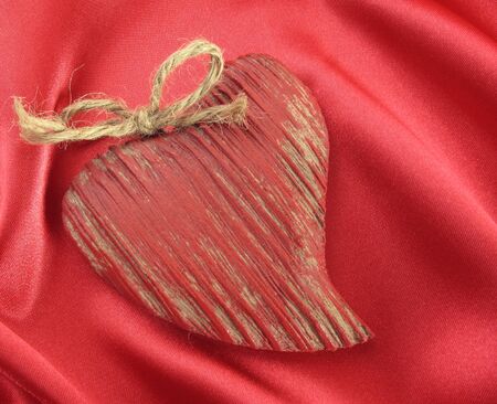Crafted wooden Heart on Satin---look for more valentine ideas in my portfolio!                               の写真素材