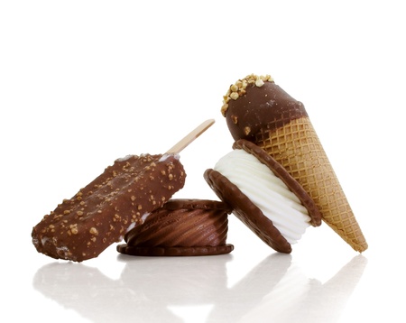 Yummy, chilly ice cream treats reflected on a crisp white backgroundの写真素材