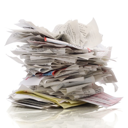 Huge stack of receipts on a white backgroundの写真素材