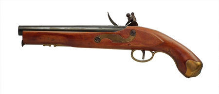 Old black powder pistol on a white background