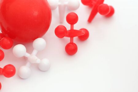 Red and Wite game of jacks on white backgroundの写真素材