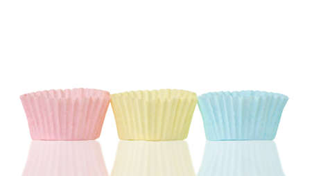 Row of cupcake papers on whiteの写真素材