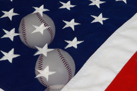 Two baseballs on flag double exposedの写真素材