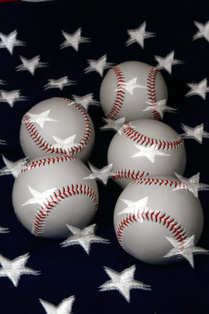 Five baseballs on flag double exposedの写真素材