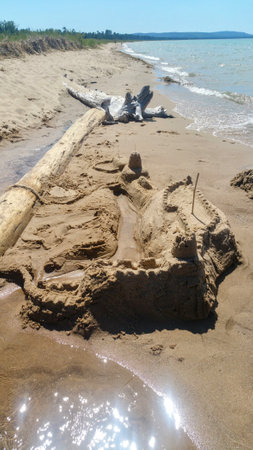 A sandcastle on the beachの写真素材