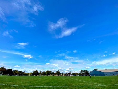 Blue Sky Over Green Soccer Field