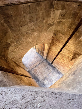 Stone Shaft Perspective with Light at Endの写真素材