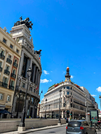 Madrid Street with Ornate Buildings and Skyの写真素材