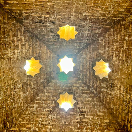 Star-Shaped Lights in Brick Ceiling