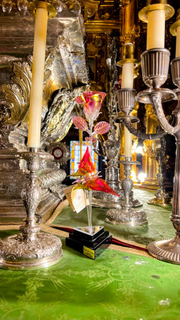Glass Rose Amidst Silver Candlesticksの写真素材