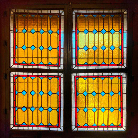 Stained Glass Window with Geometric Patternsの写真素材