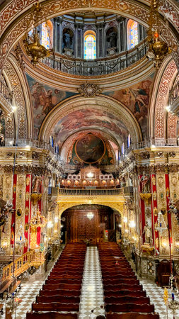Ornate Church Interior with Rows of Pewsの写真素材